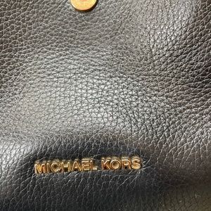 Like new Michael Kors black leather backpack